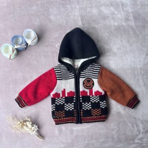 Veste bébé en laine Catimini, 12 mois, à capuche noire, avec manches rouge et marron, motifs graphiques et fermeture zippée