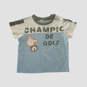 T-shirt bébé bicolore crème et bleu ciel avec texte Champion de golf, broderies ourson et boutons à l’épaule. Tom et Kiddy, 18 mois d'occasion