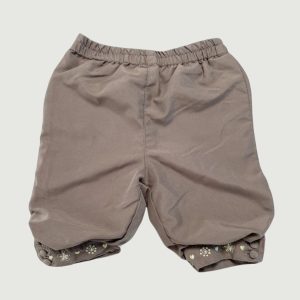 Pantalon bébé fille taupe clair à taille élastiquée avec broderies florales et boutons décoratifs aux chevilles. 3 mois d'occasion