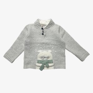 Pull bébé manches longues avec un col montant doublé et une patte de boutonnage. Seconde main.