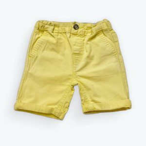 Bermuda bébé jaune délavé avec revers. Seconde main