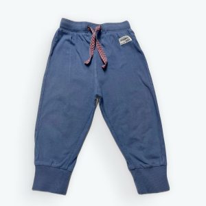 Jogging enfant bleu en maille élastiqué à la taille. Seconde main.