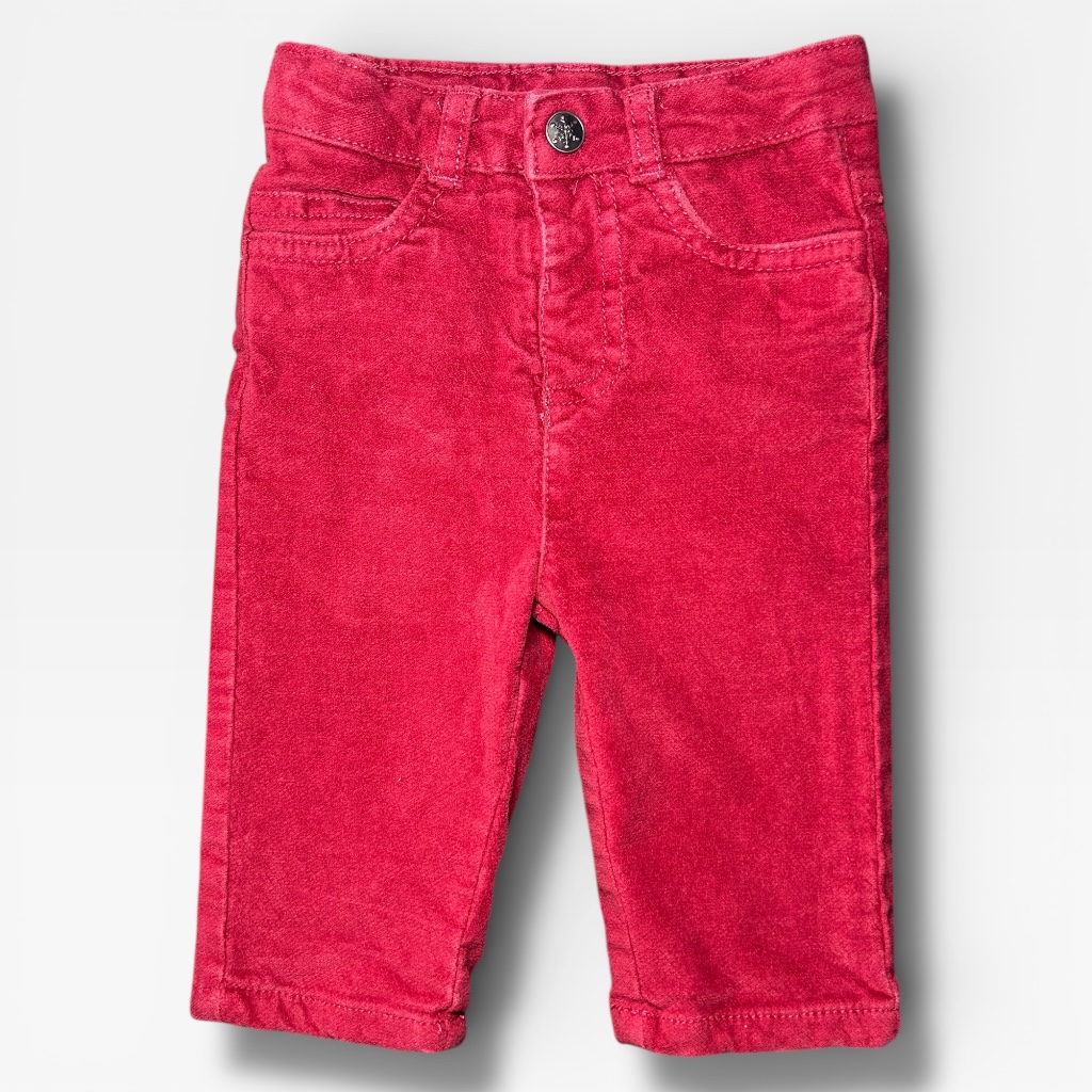 Pantalon en velours rouge pour bébé avec poches et bouton à la taille. Orchestra, 6 mois, d'occasion.