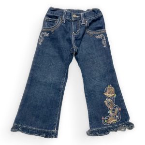 Pantalon jean enfant brodé et avec le bas volanté. Seconde main.