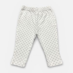 Legging bébé fond blanc avec des motifs étoiles gris clair. Seconde main.