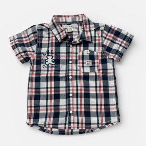 Chemise bébé manches courtes motifs écossais poche plaquée. Seconde main.