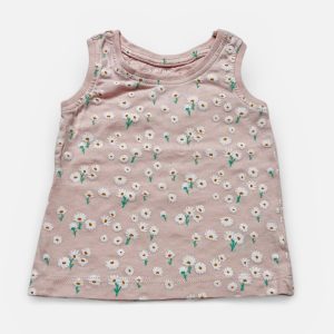 Débardeur bébé vieux rose avec des motifs répétés fleurs. Seconde main.