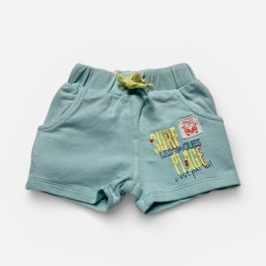 Short bébé en maille bleu clair, avec des poches et élastiqué à la taille. Seconde main.