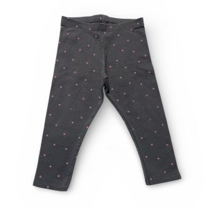 Legging bébé chocolat avec des motifs répétés cœurs roses. Seconde main.