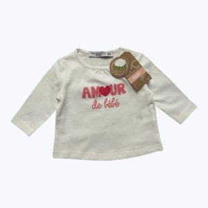 T-shirt bébé manches longues blanc avec un dessin message devant. Seconde main.