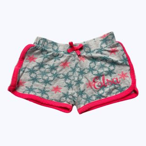 Short enfant en maille gris clair bordé d'un biais orange fluo. Seconde main.