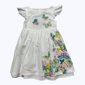 Robe enfant blanche manches courtes volantées entièrement doublée dos nu. Seconde main.