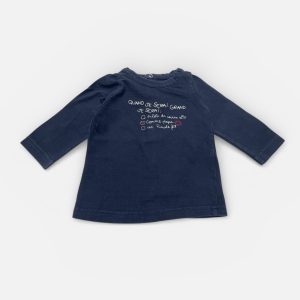 T-shirt bébé manches longues bleu marine avec un message devant et l'ouverture dans le dos. Seconde main.