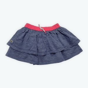 Jupe enfant maille rayée blanc bleu élastiquée à la taille avec un cordon décoratif. Seconde main.