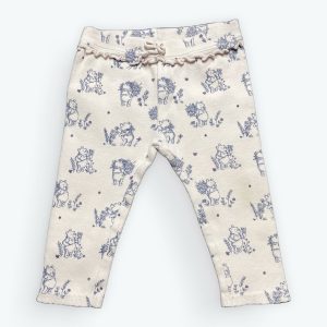 Legging bébé rose pâle motifs répétés Winnie. Seconde main.