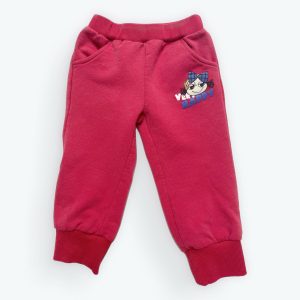 Jogging bébé rouge avec un petit imprime fille sous la poche. Seconde main.