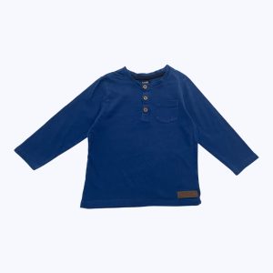 T-shirt bébé manches longues bleu foncé, avec une petite poche plaquée devant. Seconde main.