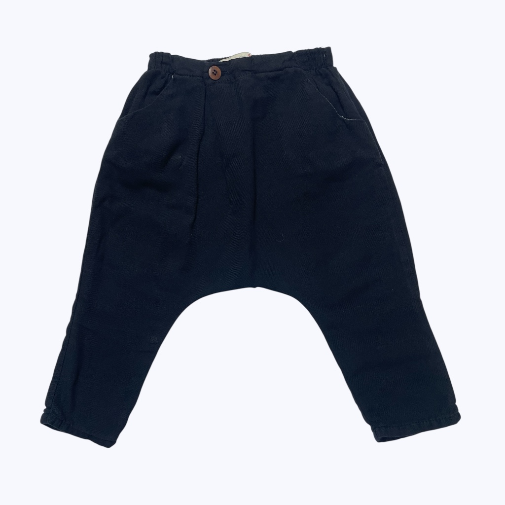 Pantalon bébé noir type sarouel entièrement doublé. Seconde main.