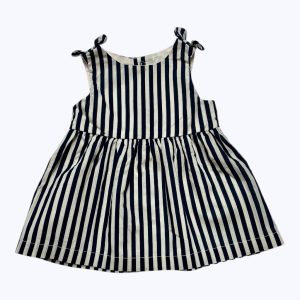 Robe bébé rayée blanche bleu marine, froncée à la taille. Seconde main.
