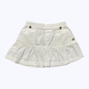 Jupe bébé blanc cassé, froncée aux hanches élastiquée à la taille. Seconde main.