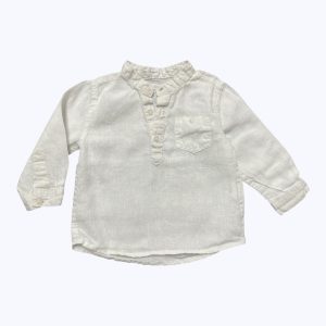 Chemise bébé blanche manches longues col V patte de boutonnage décoratif. Seconde main.
