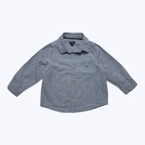 Chemise bébé manches longues bleu à petits points marine, poche passepoil devant. Seconde main.
