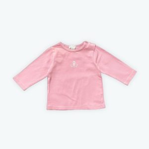 T-shirt bébé manches longues rose sérigraphie logo blanc devant patte de boutonnage épaule. Seconde main.