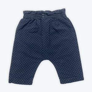 Pantalon bébé type sarouel bleu marine à pois blancs. Seconde main.