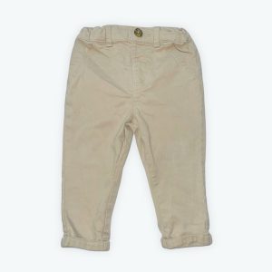 Pantalon bébé beige taille ajustable, revers au bas. Seconde main.