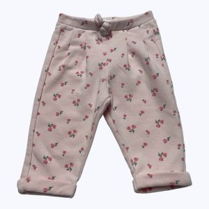 Jogging bébé molleton rose clair motifs fleurs rose et vert. Seconde main.