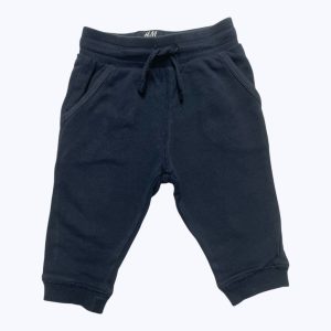 Jogging enfant bleu marine élastique et cordon à la taille. Seconde main.