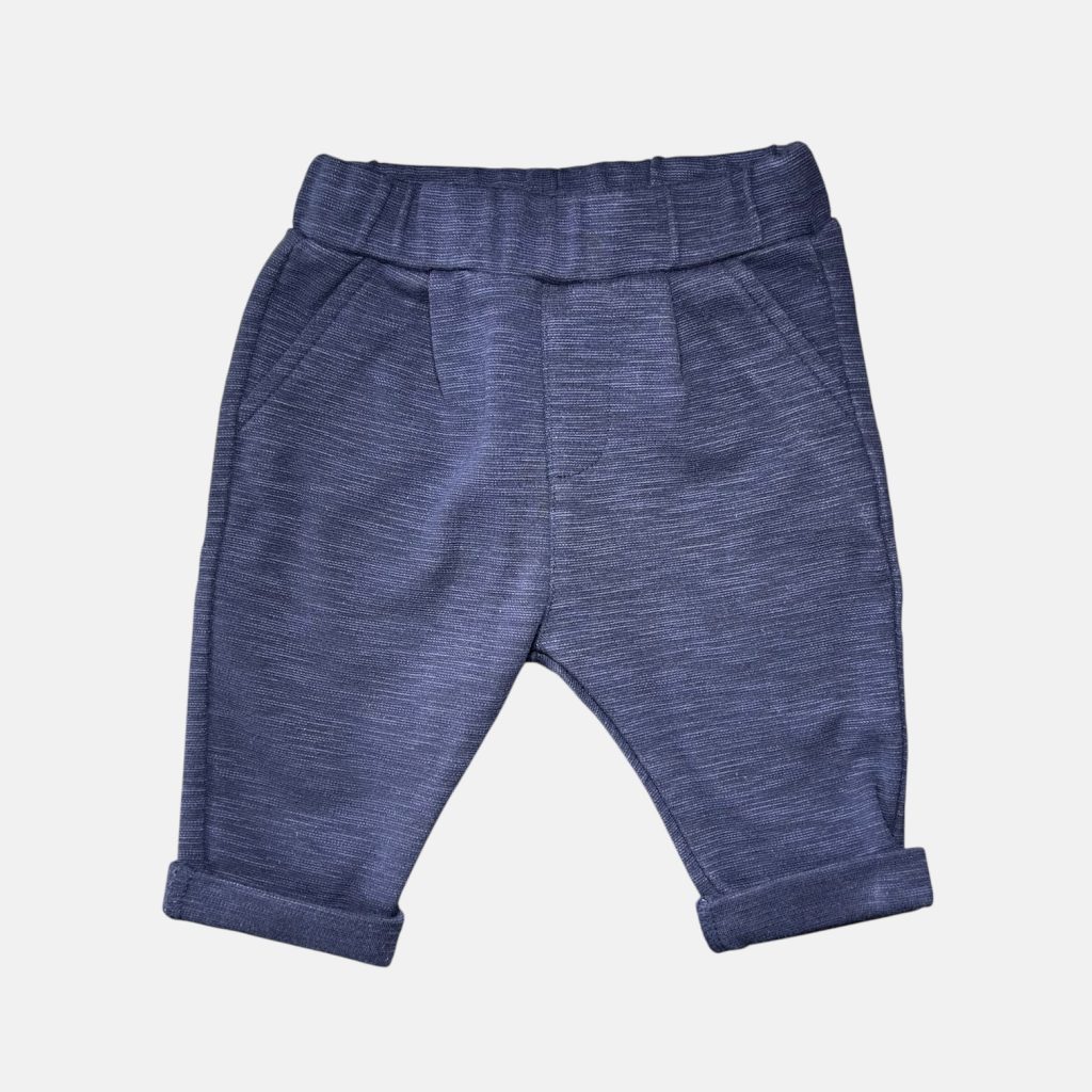 Pantalon bébé bleu marine avec taille élastique et revers aux chevilles. Kiabi, 6 mois d'occasion