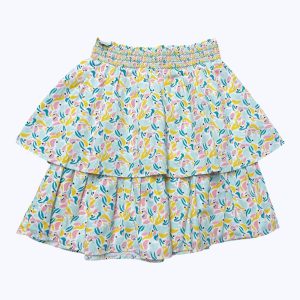 Jupe enfant à volant blanche aux motifs bleu moutarde vert d'eau rose. Seconde main.