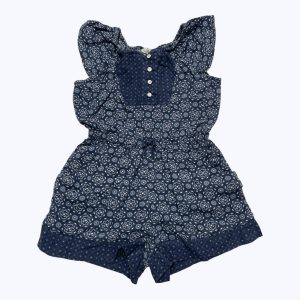 Combishort enfant manches courtes blanc et marine, motifs géométriques, élastiquée à la taille patte de boutonnage devant. Seconde main.