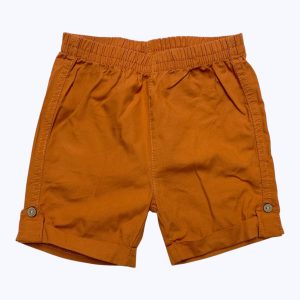 Short bébé rouille avec revers et taille élastique. Seconde main.