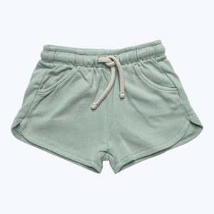 Short bébé maille vert amande clair, taille élastique et cordon. Seconde main.