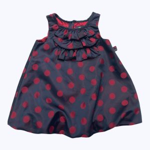 Robe bébé débardeur satinée bleu marine à pois bordeaux, entièrement doublée pour un effet ballon, patte de boutonnage zip au dos. Seconde main.