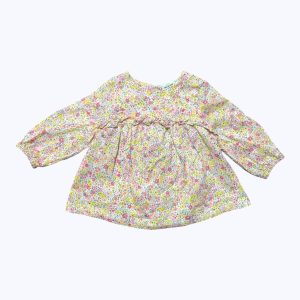 Blouse bébé manches longues blanche imprimé petites fleurs pastels. Seconde main.